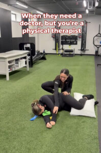Physical Therapist helping patient