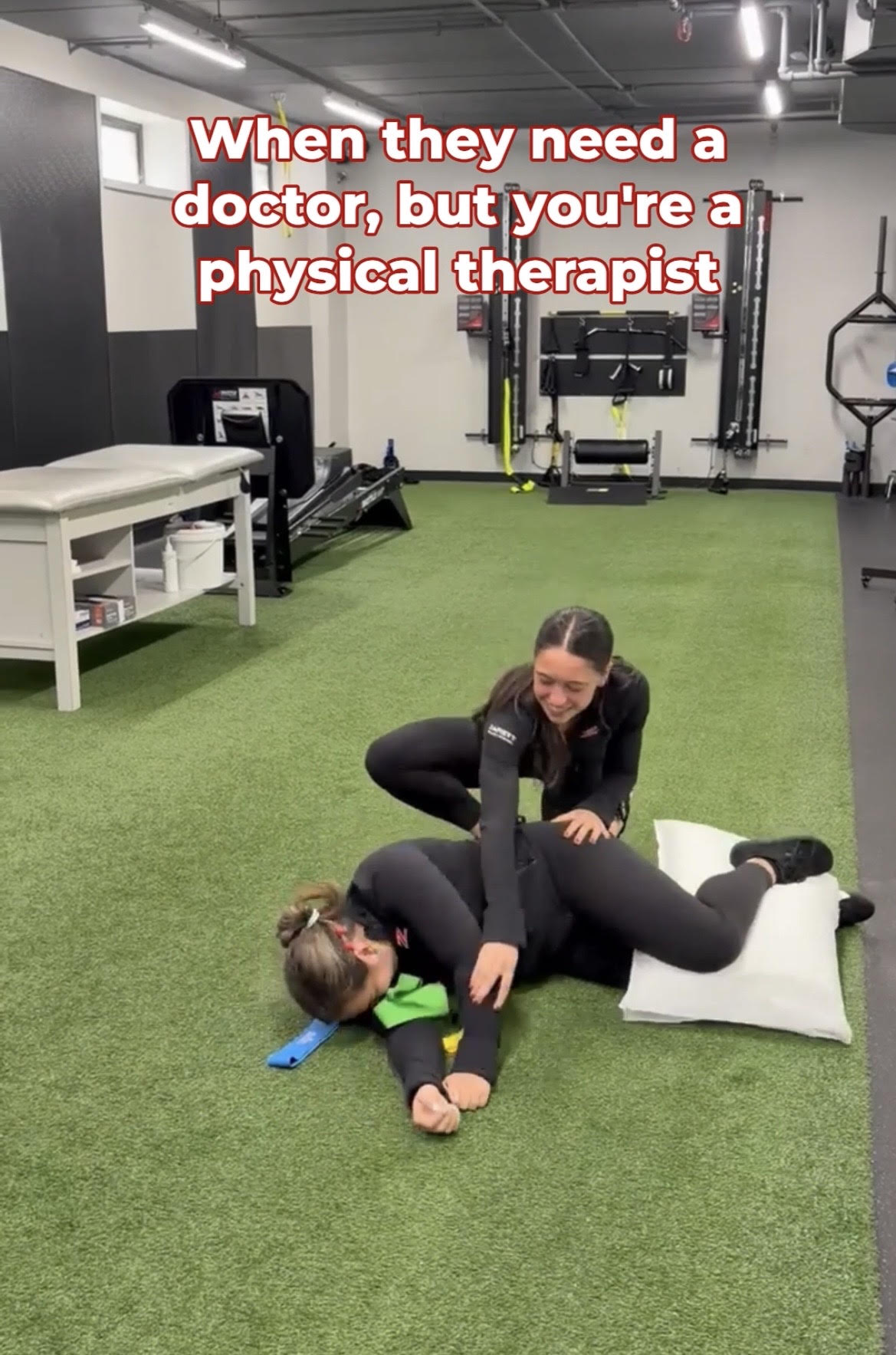 Physical Therapist helping patient
